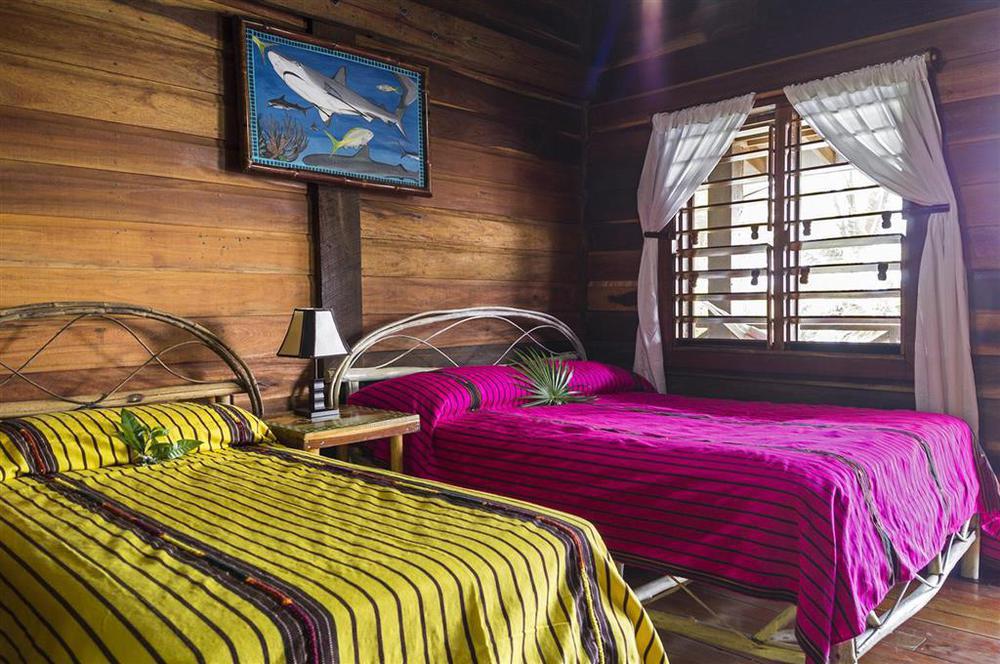 Itza Resort Long Caye Pokoj fotografie
